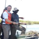 Kronprins Haakon på fisketur med lokale fiskere i Okavango-deltaet, Botswana 12.11.2009. 
Handoutbilde fra Det Kongelige Hoff. Bildet er kun til redaksjonell bruk - ikke for salg. Størrelse: 2816 x 2112 px,, 643 kb (Foto: Ida Fjeldbraaten: Det kongelige hoff)